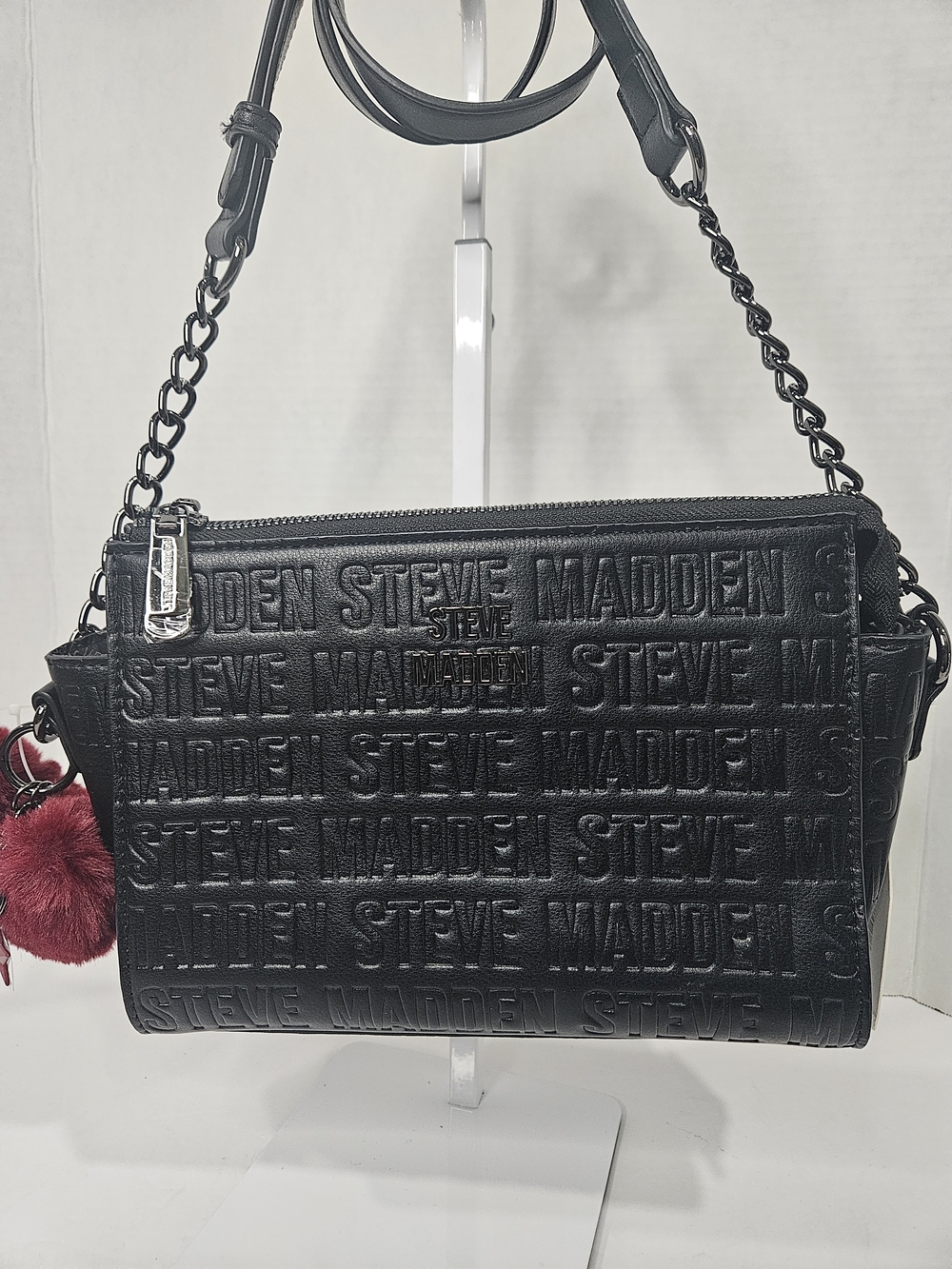 Steve Madden Black Embossed Logo Crossbody with Chain Strap and Burgundy Pom